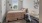 bedroom with a window, bed and desk